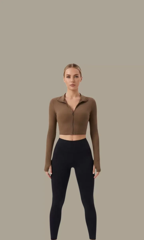 Kadın Kahverengi Uzun Kol Fermuarlı Parmak Geçme Detaylı Dik Yaka Crop Top Bluz – Şık, Rahat ve Kolay Kombinlenebilir